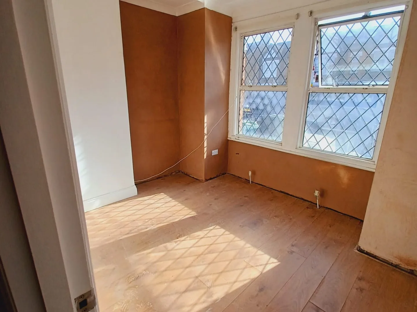 Replastered wall after a completed rising damp treatment